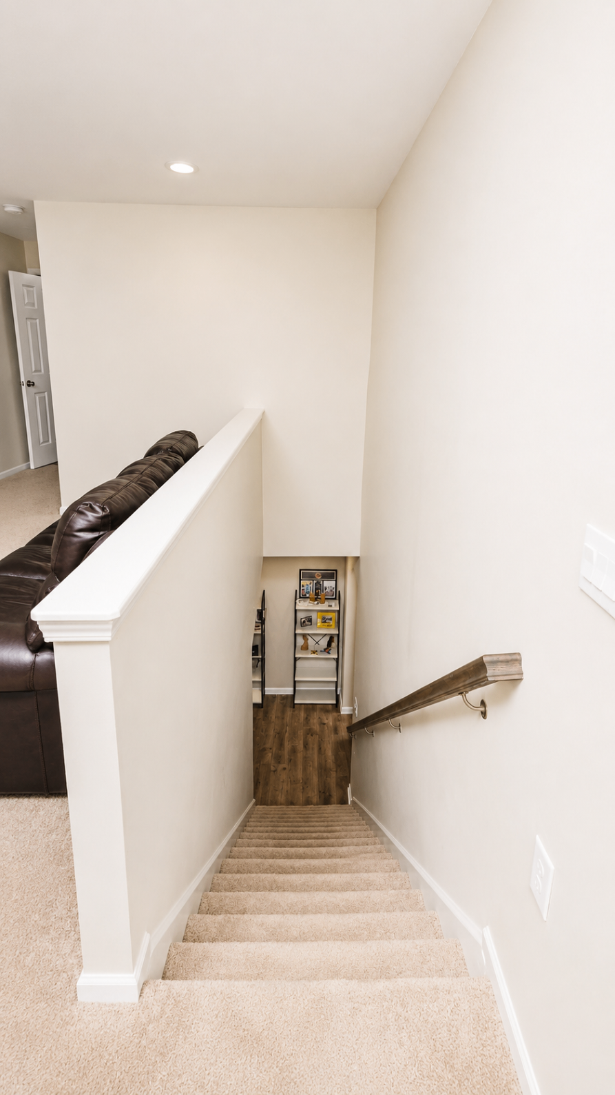 View from the upstairs landing down toward the main floor