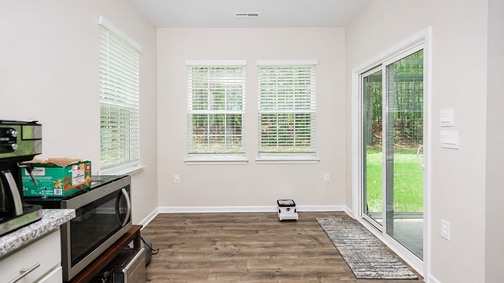Breakfast nook with sliding door to the backyard
